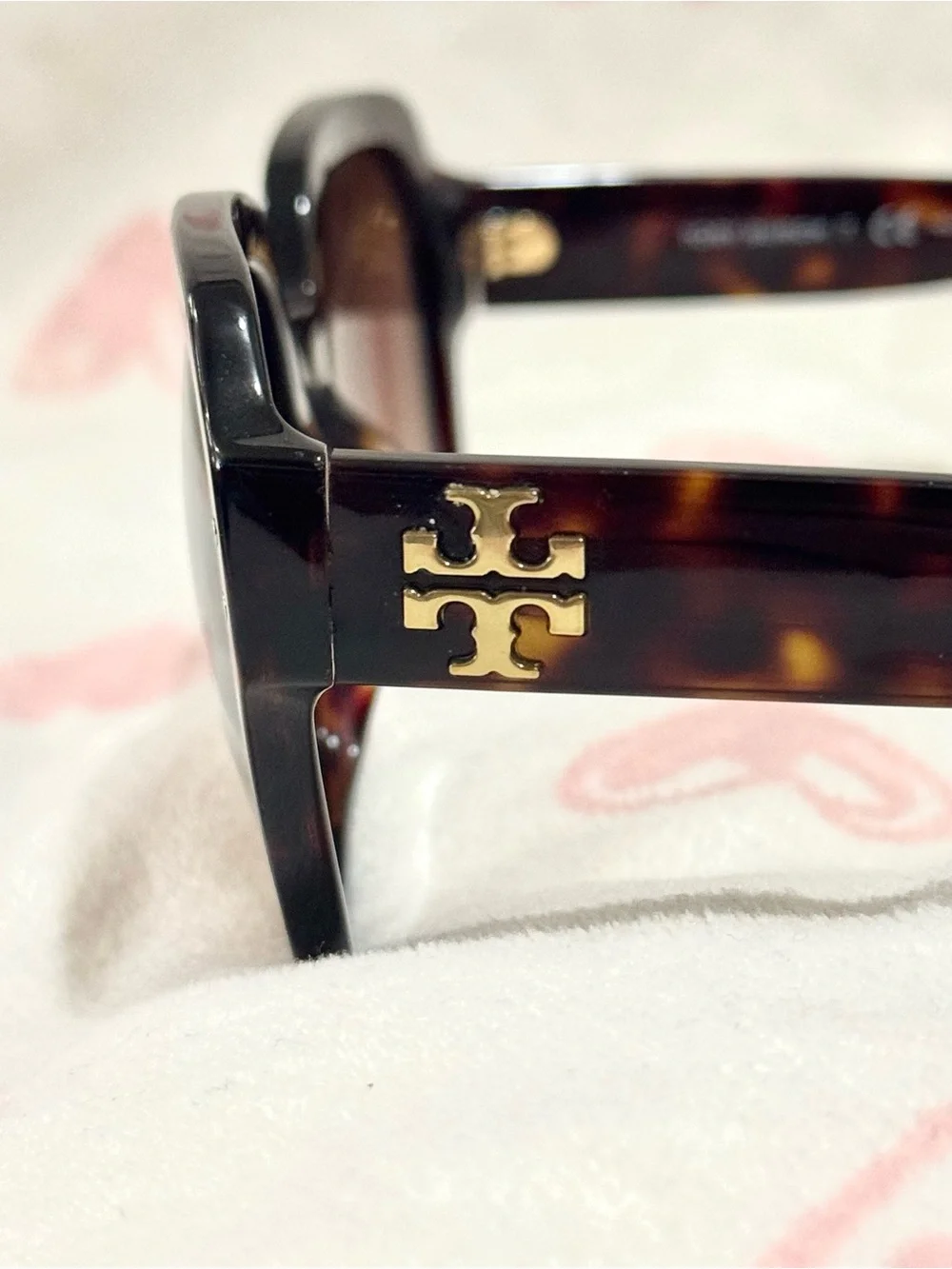 Tory Burch sunglasses with a tortoiseshell pattern